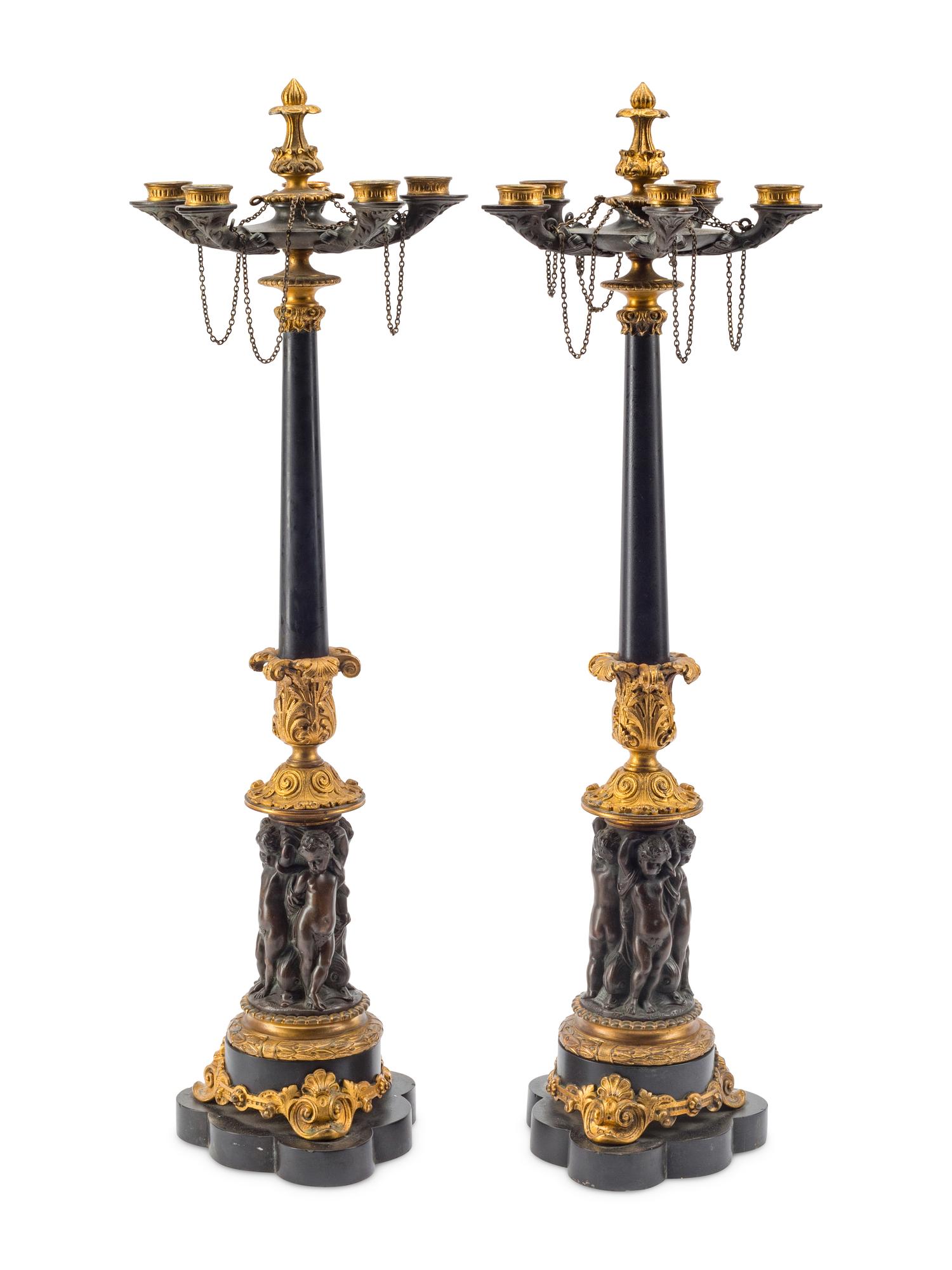 A Pair of French Gilt and Patinated Bronze Five-Light Candelabra
