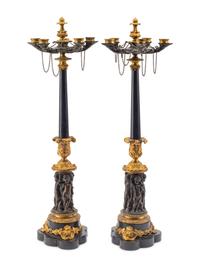 A Pair of French Gilt and Patinated Bronze Five-Light Candelabra
