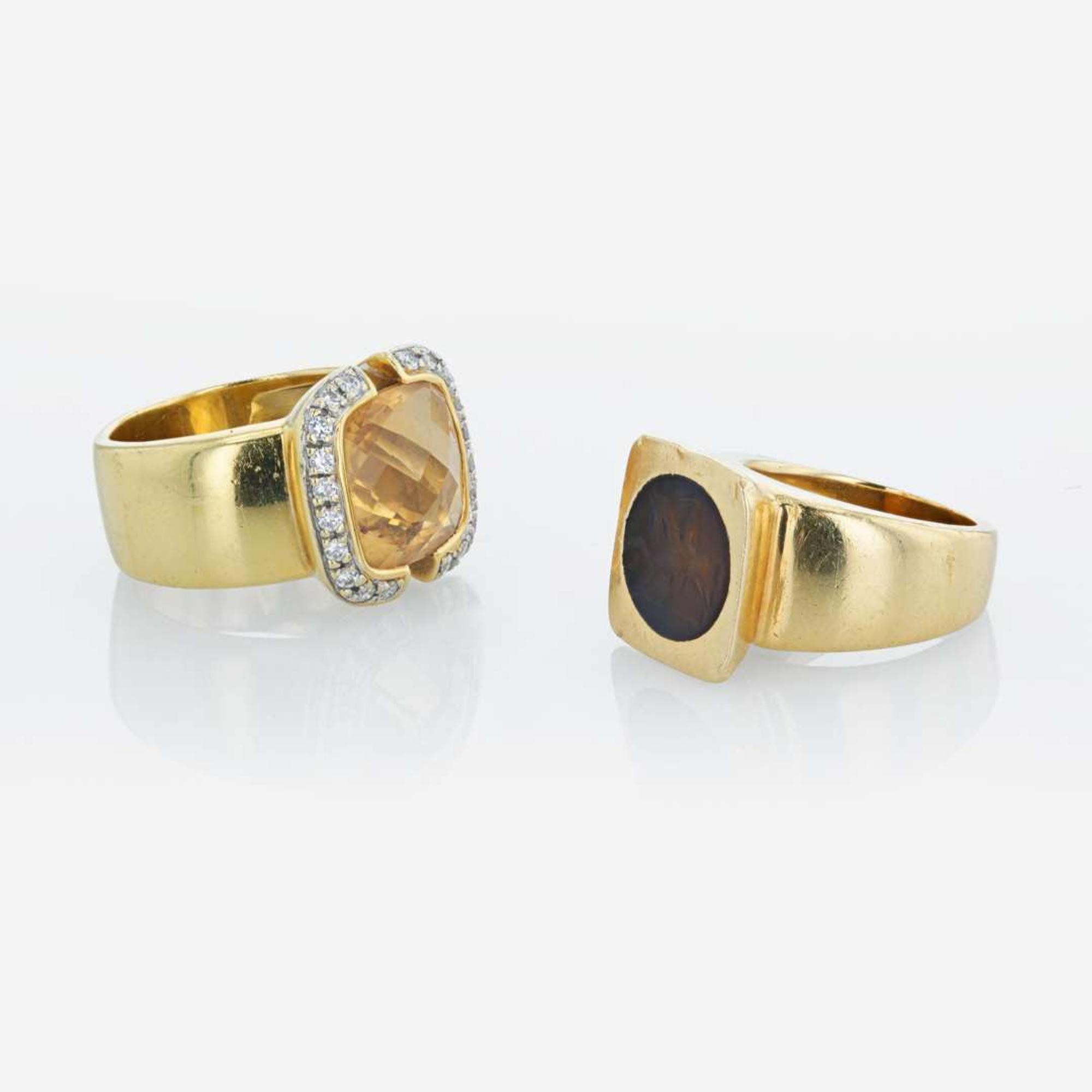Two 18K yellow gold lady's gemstone rings