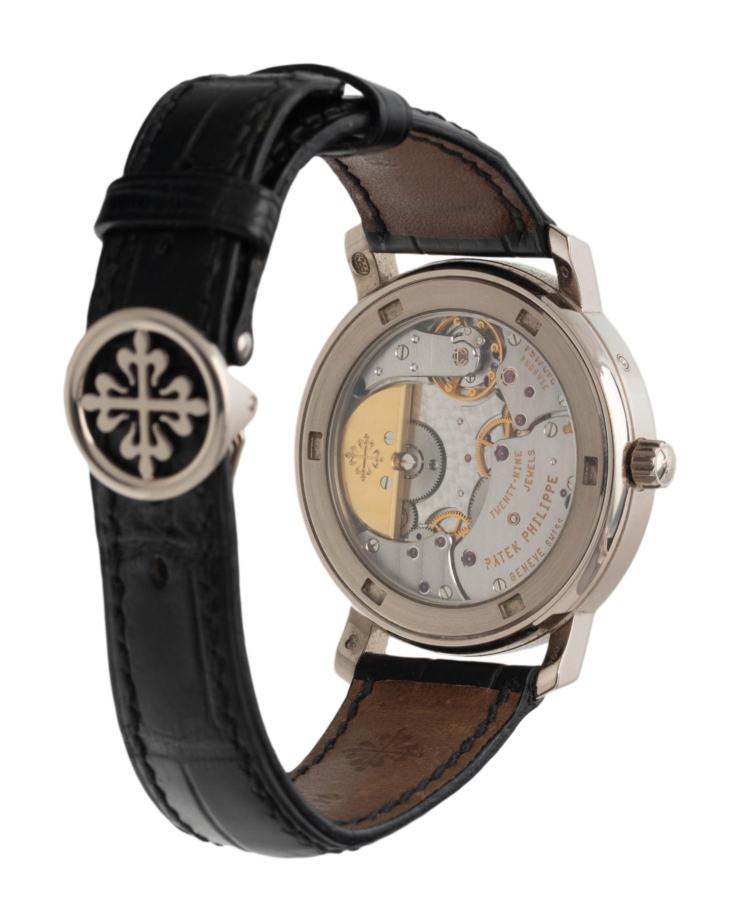 A FINE PATEK PHILIPPE, REF. 5055 18K WHITE GOLD MOONPHASE WRISTWATCH