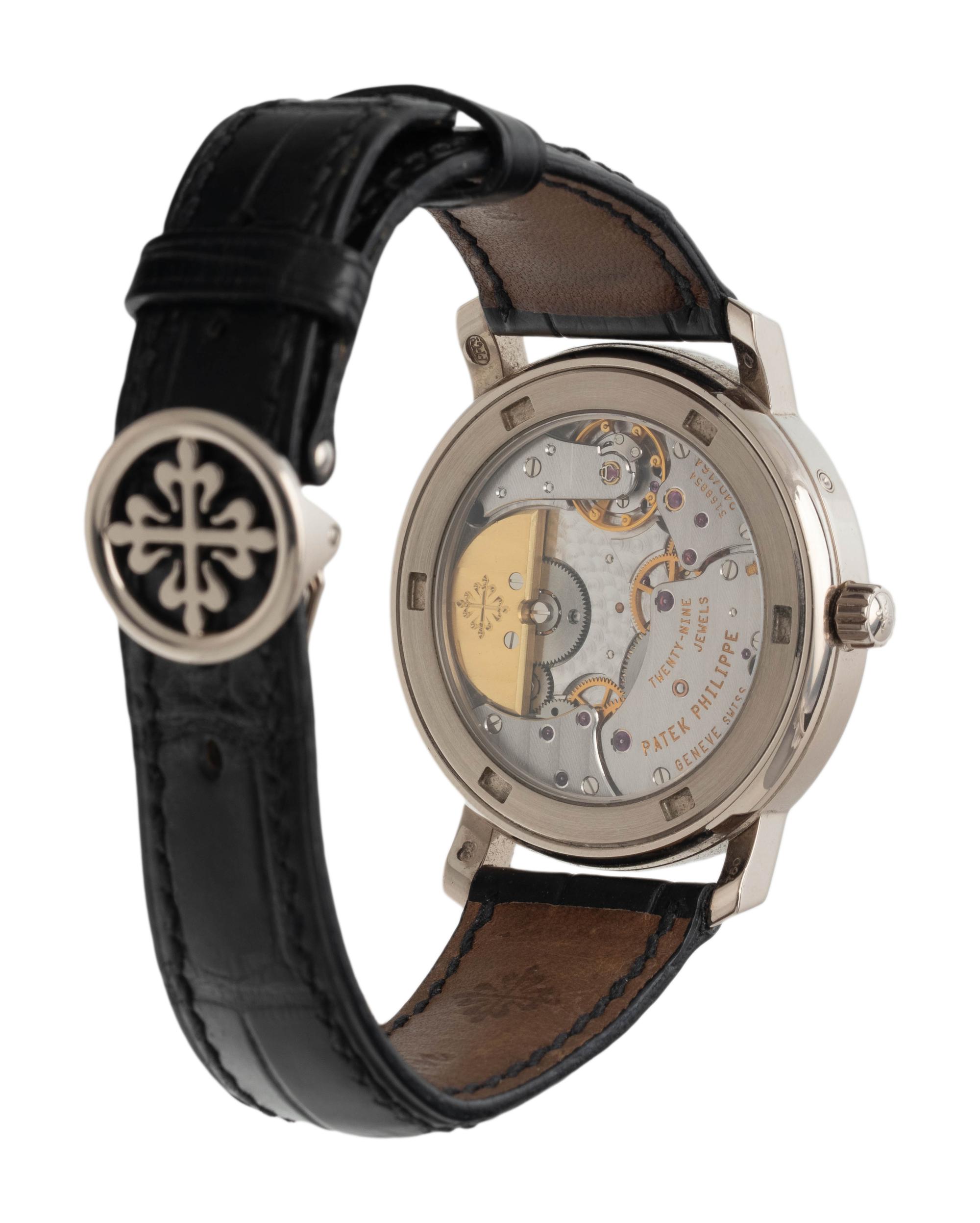 A FINE PATEK PHILIPPE, REF. 5055 18K WHITE GOLD MOONPHASE WRISTWATCH