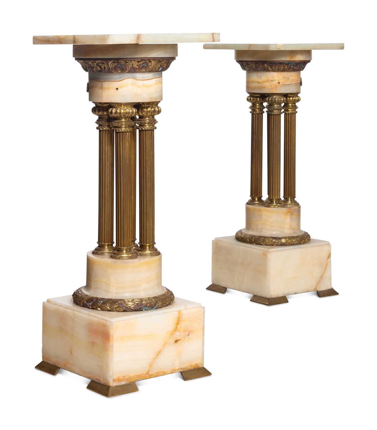 A Pair of Continental Gilt Bronze Mounted Onyx Pedestals