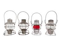 A Group of Four Chromed Metal Railroad Signal Lanterns
