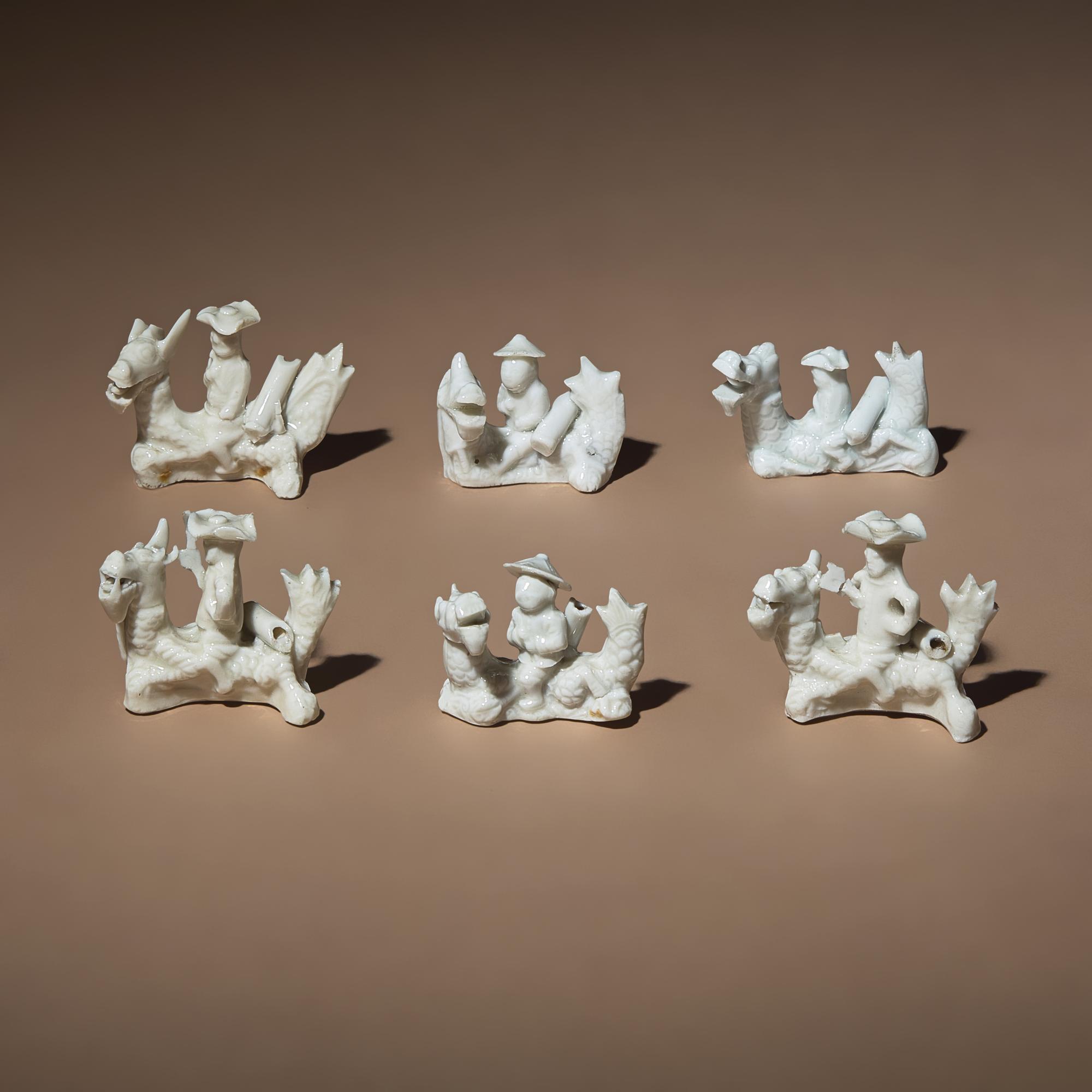 Six Chinese Blanc-de-Chine Porcelain Figural Group-Form Whistles, Late 17th-18th Century — 清早期 德化白瓷塑人像哨六件
