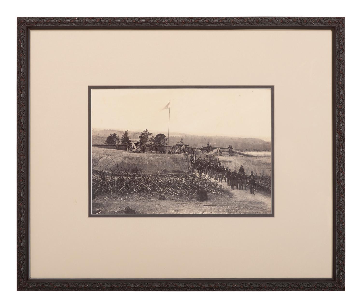 [CIVIL WAR]. [BRADY, Mathew (1822-1896), photographer, attrib.]. Large format photograph of Fort Stevens overlooking the Potomac River, including Union gunners in action. Ca 1864.