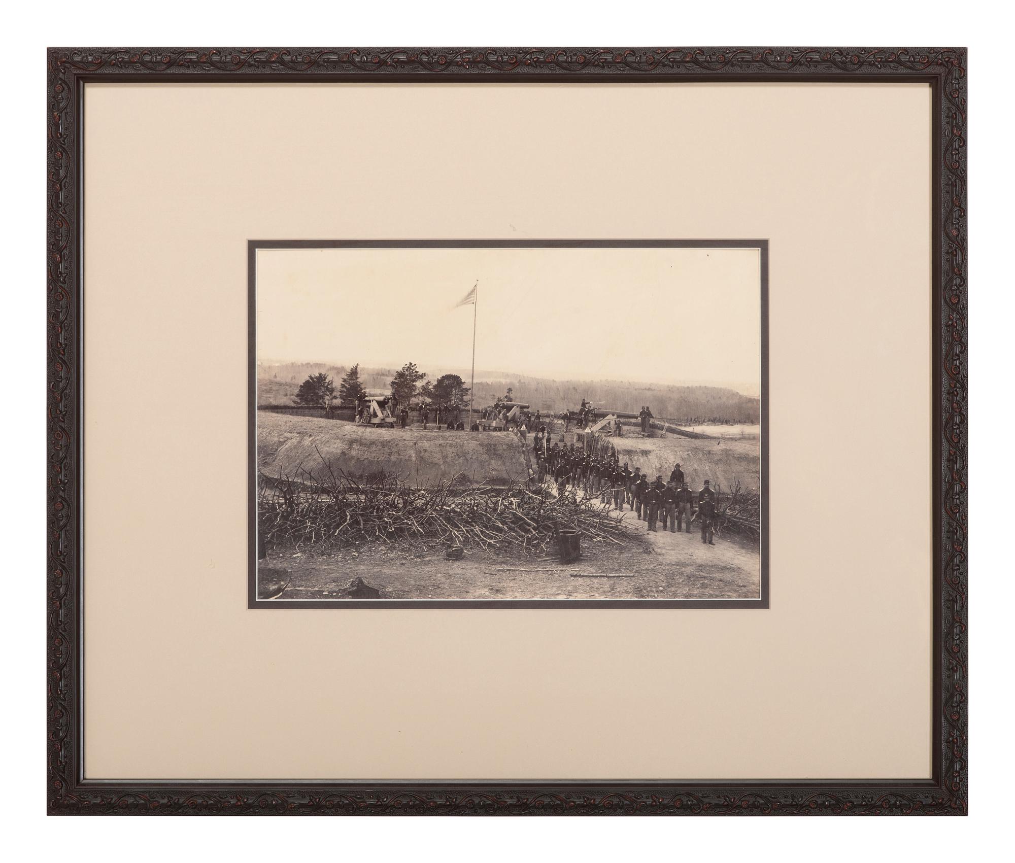 [CIVIL WAR]. [BRADY, Mathew (1822-1896), photographer, attrib.]. Large format photograph of Fort Stevens overlooking the Potomac River, including Union gunners in action. Ca 1864.