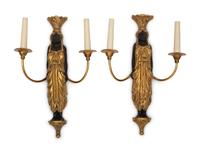 A Pair of Continental Empire Style Ebonized and Parcel Gilt Two-Light Figural Sconces