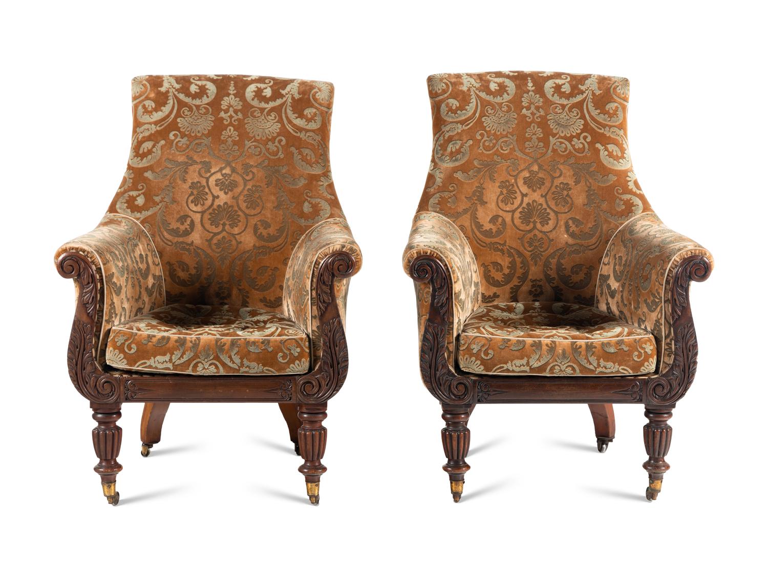 A Pair of William IV Carved Walnut Library Armchairs