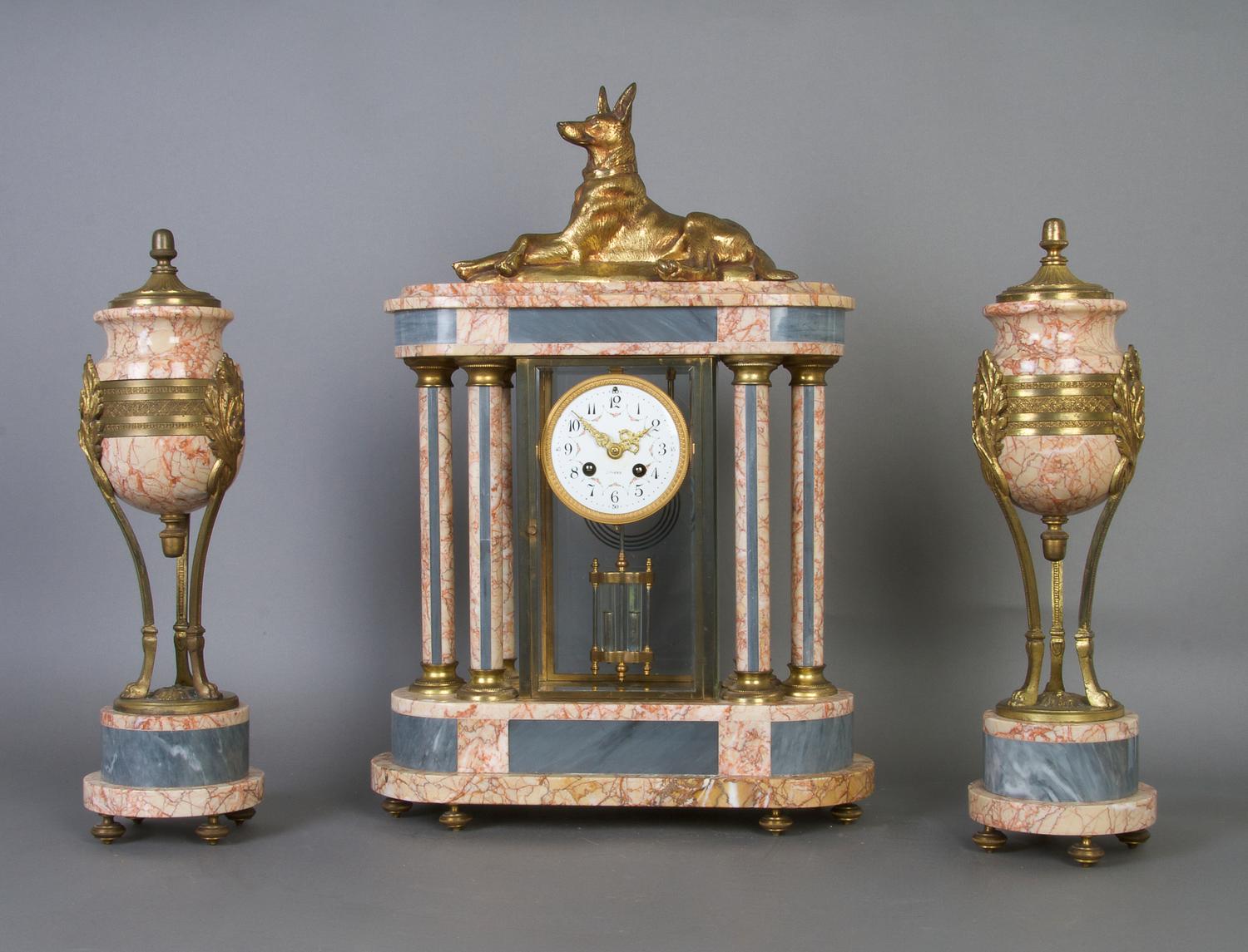 A French Marble and Gilt Metal Three Piece Clock Garniture, Lardot et Boyon, Height of clock 22 inches.