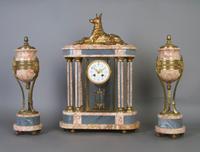 A French Marble and Gilt Metal Three Piece Clock Garniture, Lardot et Boyon, Height of clock 22 inches.