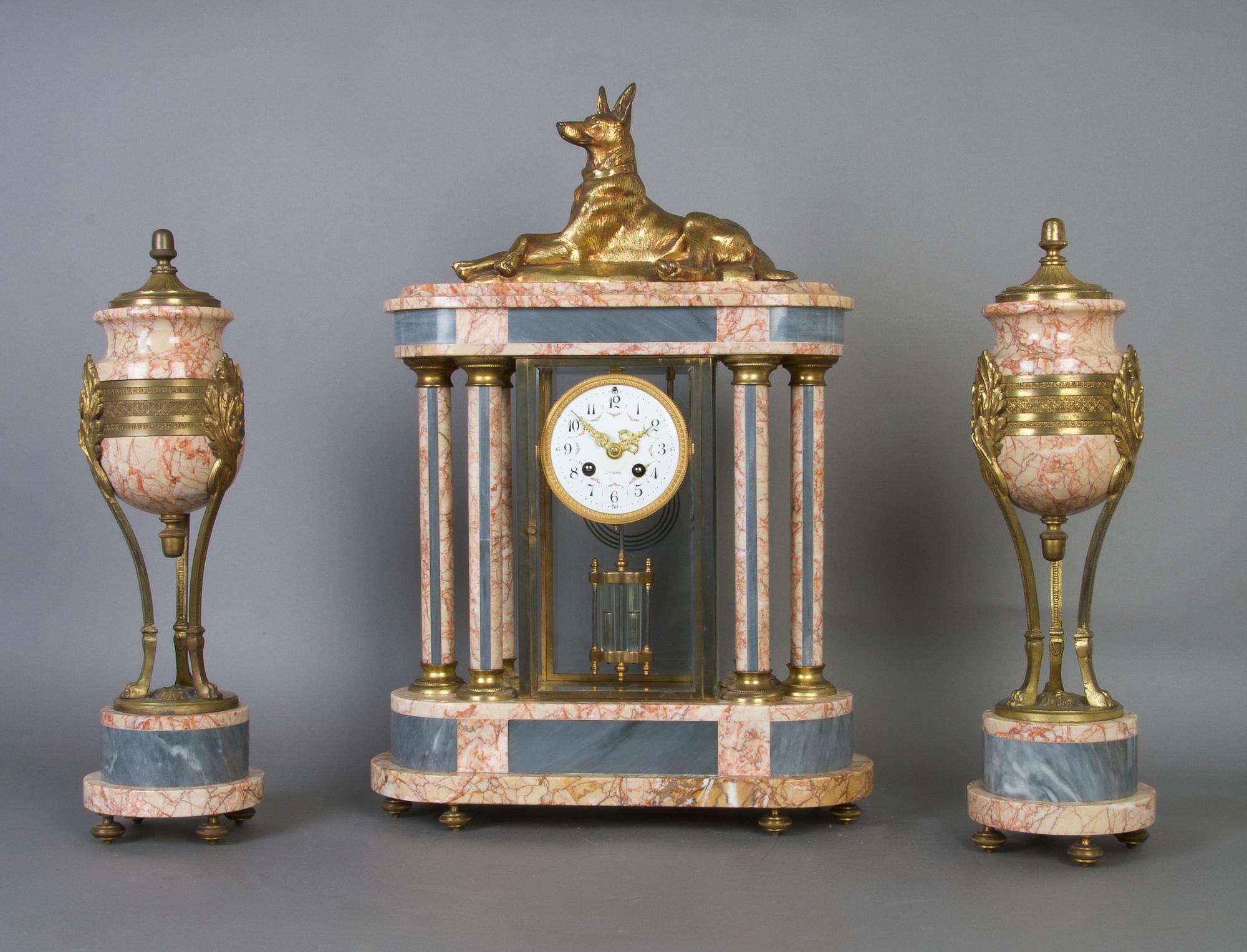 A French Marble and Gilt Metal Three Piece Clock Garniture, Lardot et Boyon, Height of clock 22 inches.
