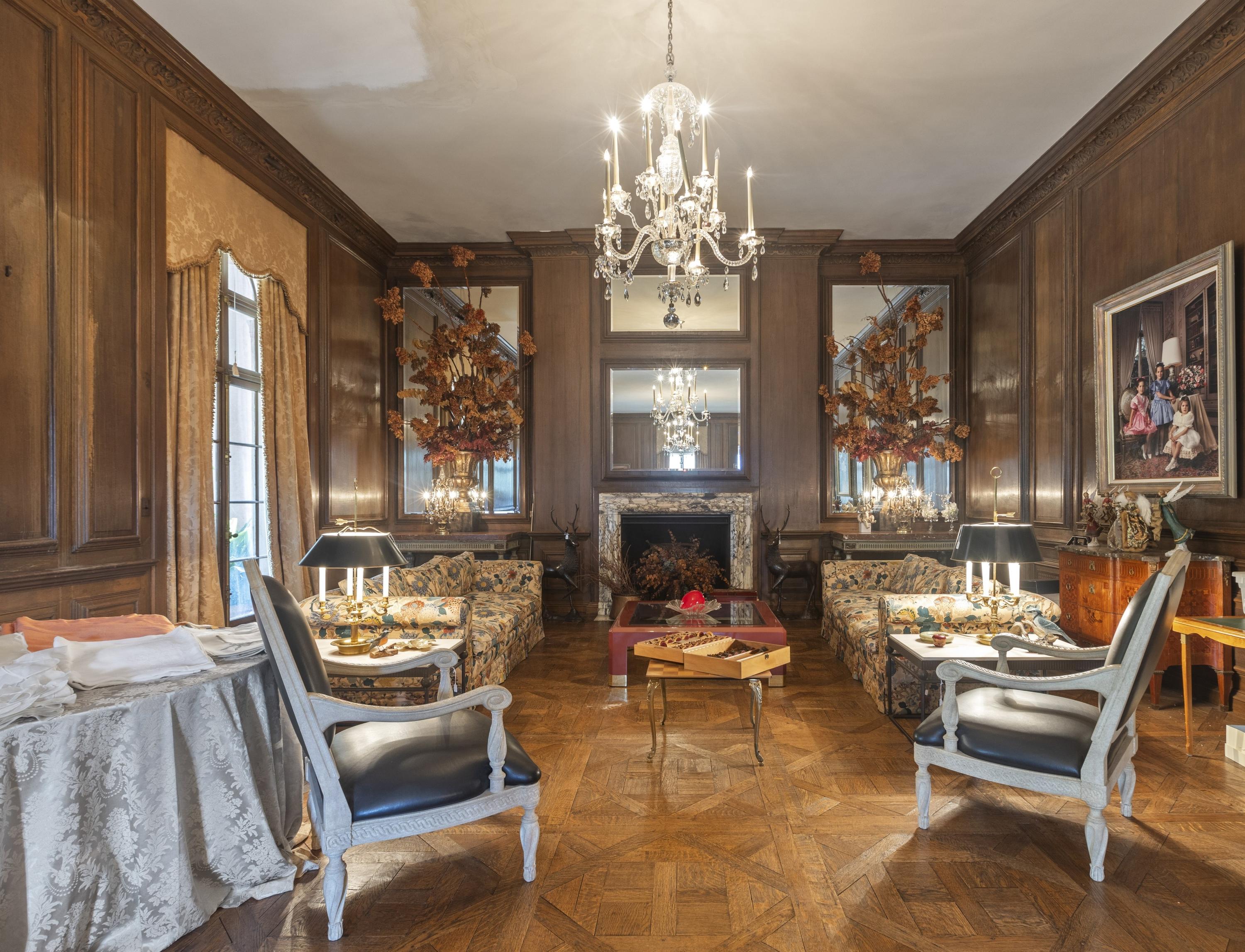 A White-Painted Cast Iron Outdoor Dining Suite