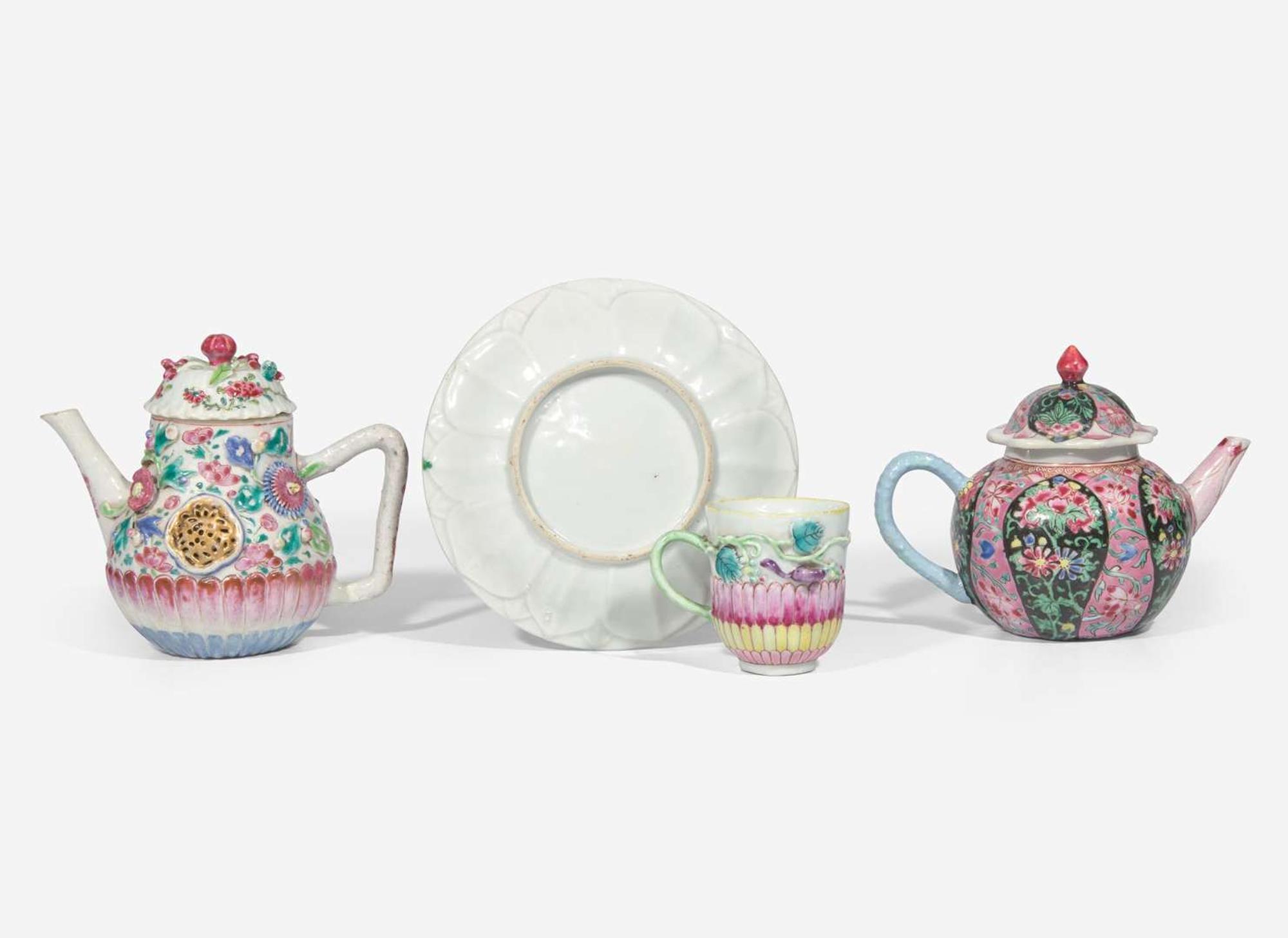 Two Chinese export famille rose porcelain teapots, a stand and a teacup, Yongzheng to early Qianlong period 粉彩茶壺兩件 及座子和茶杯 清 雍正至乾隆
