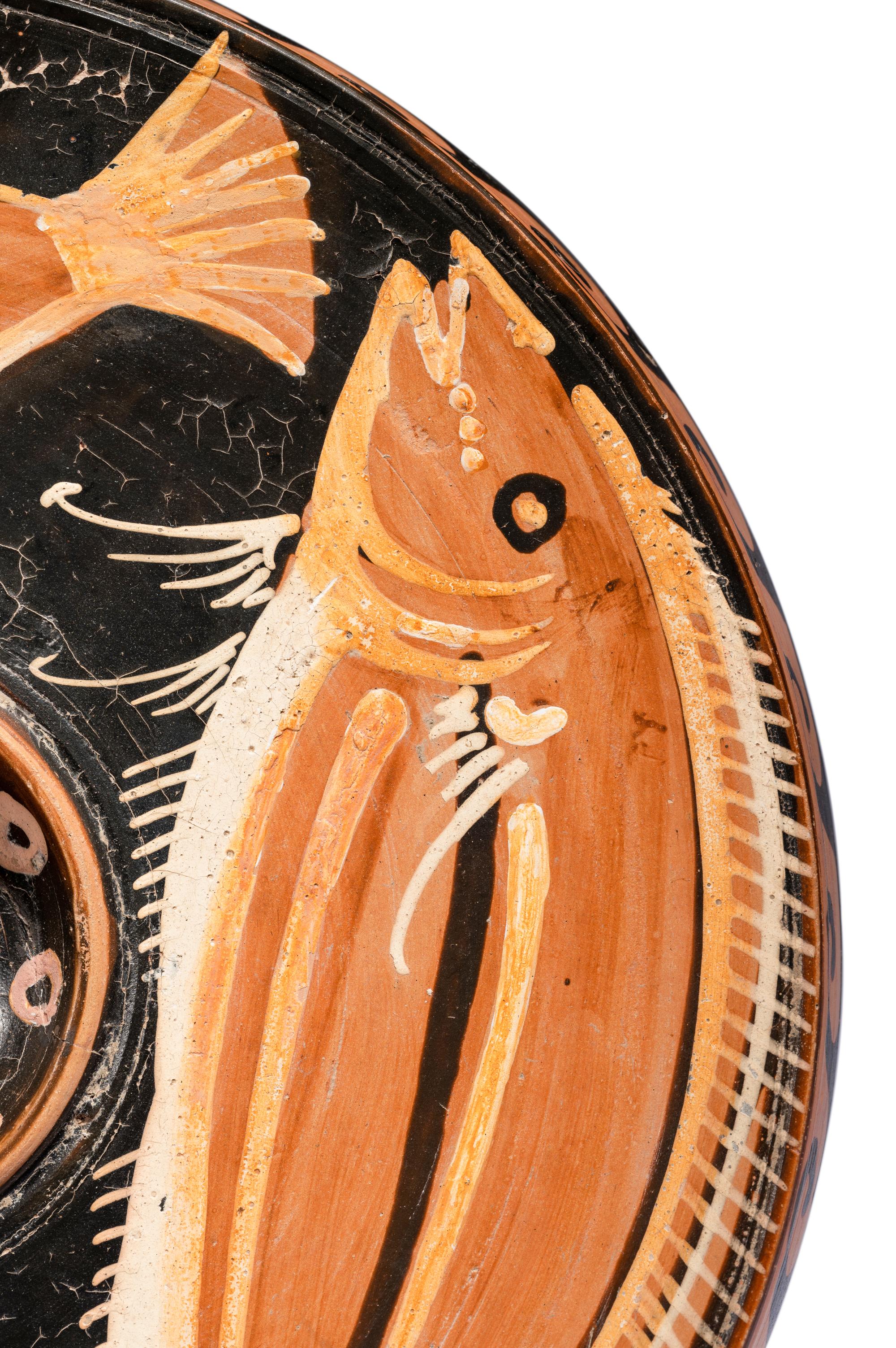An Apulian Red-Figured Fish Plate