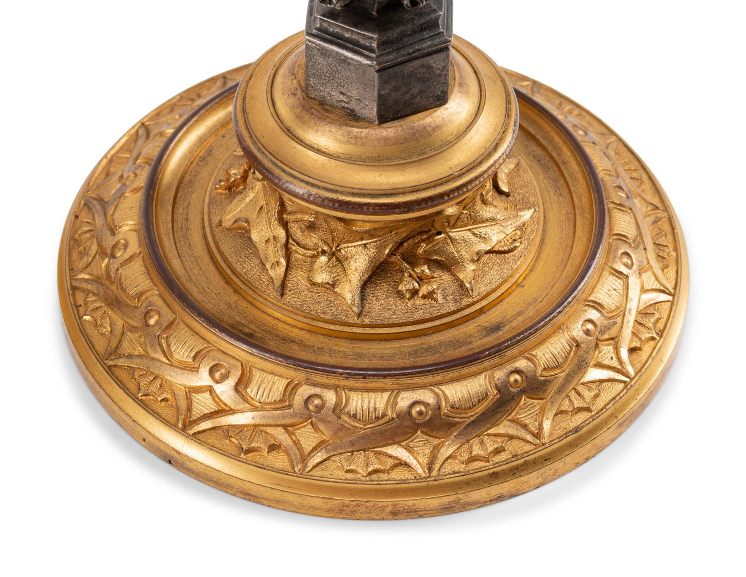 A Pair of Continental Gilt Bronze and Pewter Candlesticks