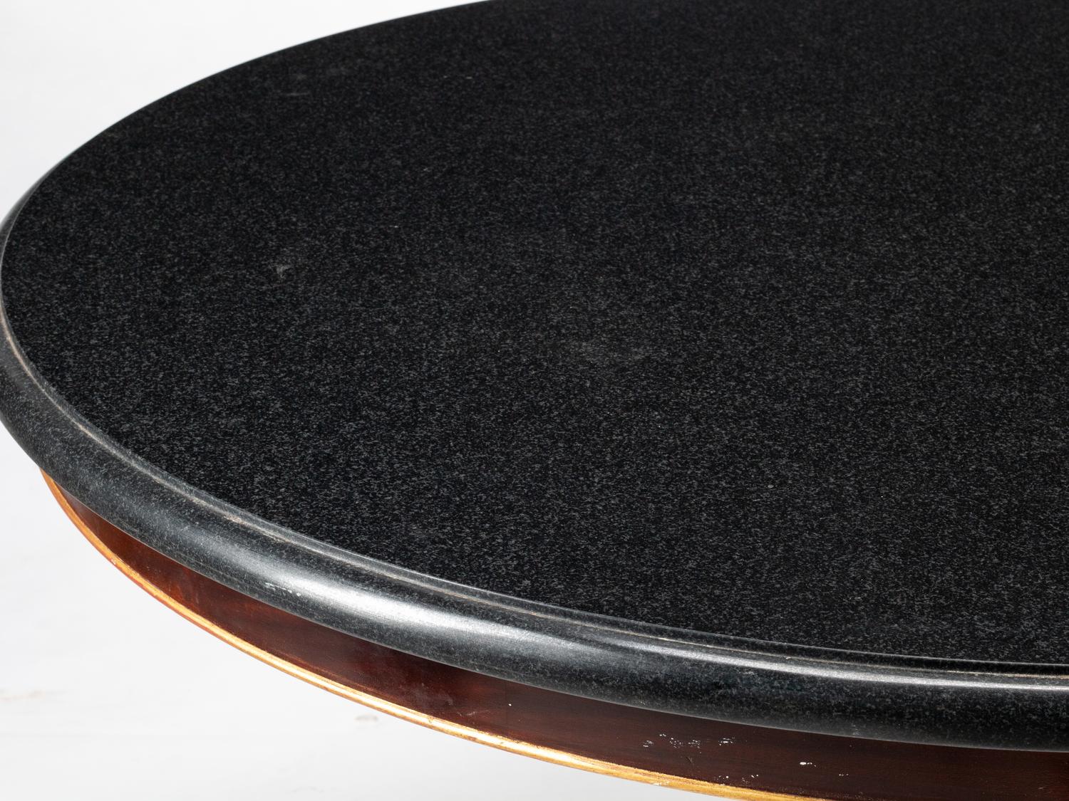 An Empire Style Parcel Gilt Mahogany Marble-Top Center Table