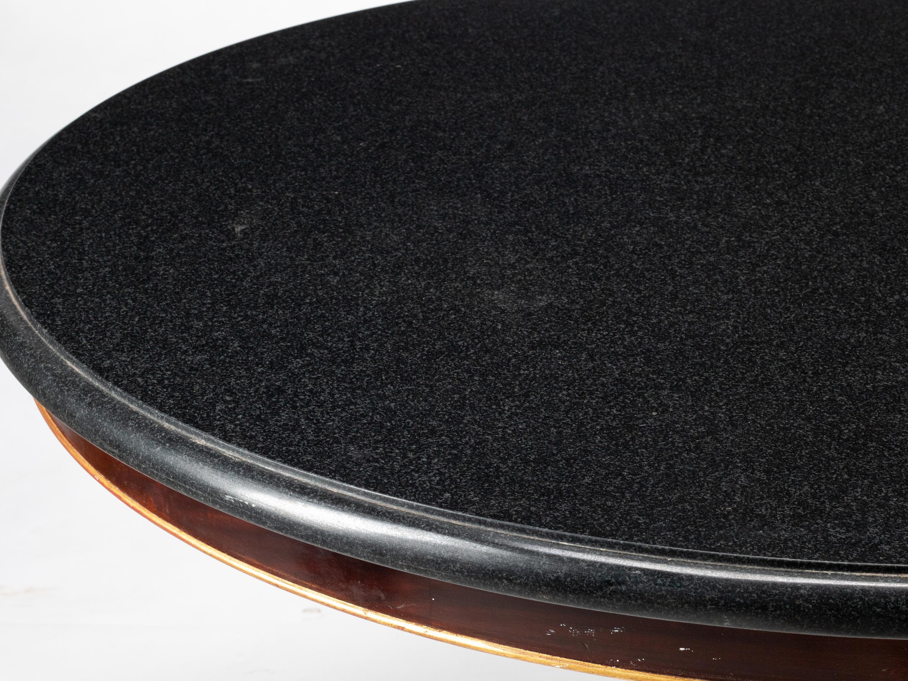 An Empire Style Parcel Gilt Mahogany Marble-Top Center Table