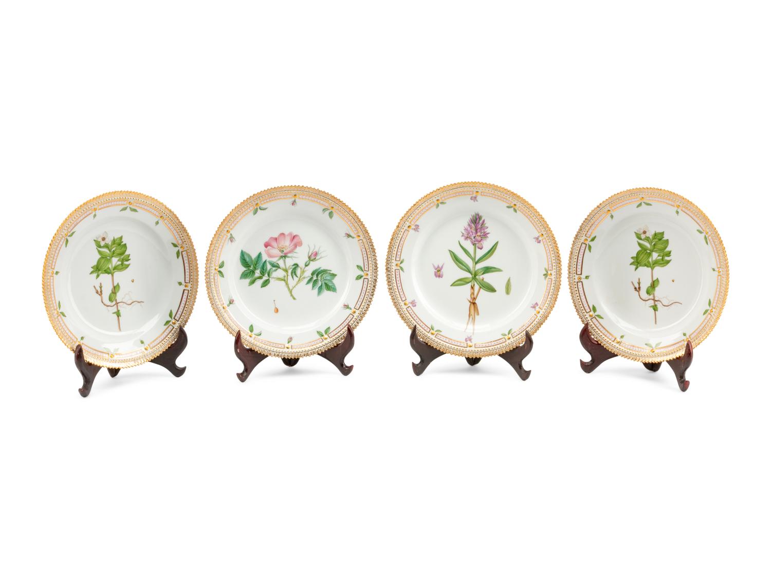 A Set of Four Royal Copenhagen Flora Danica Porcelain Plates