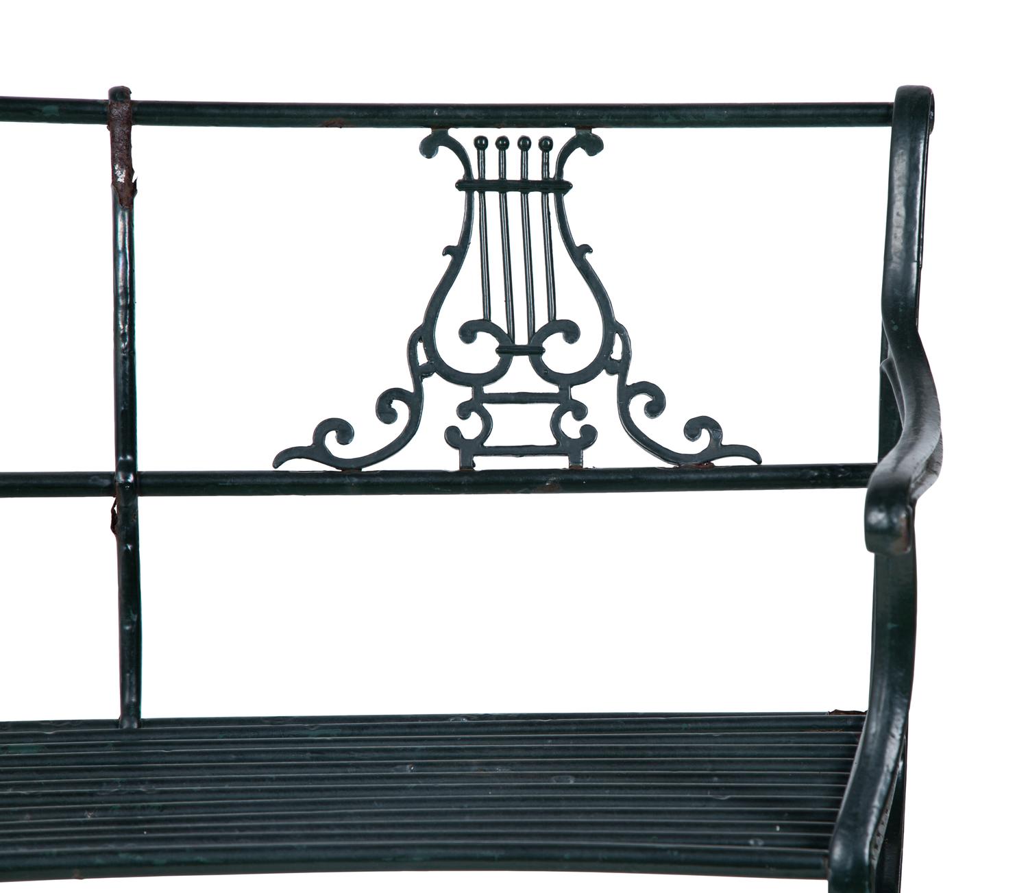 An English Cast Iron Six-Piece Garden Suite — EARLY 20TH CENTURY