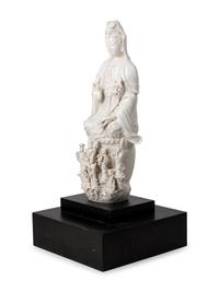 A Chinese White Glazed Porcelain Figure of Guanyin