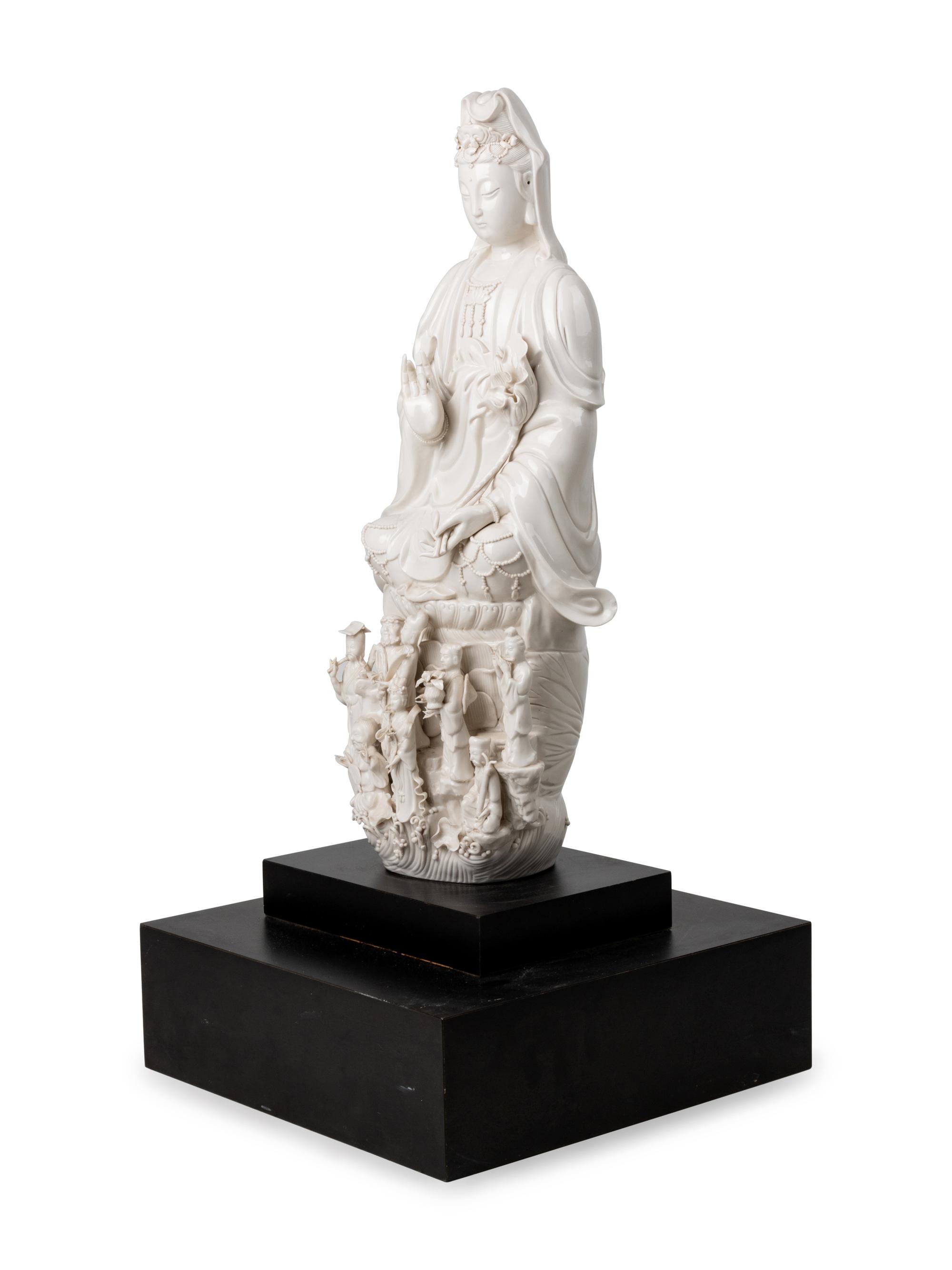 A Chinese White Glazed Porcelain Figure of Guanyin