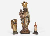 A group of three carved and painted Santos figures, 19th / 20th century