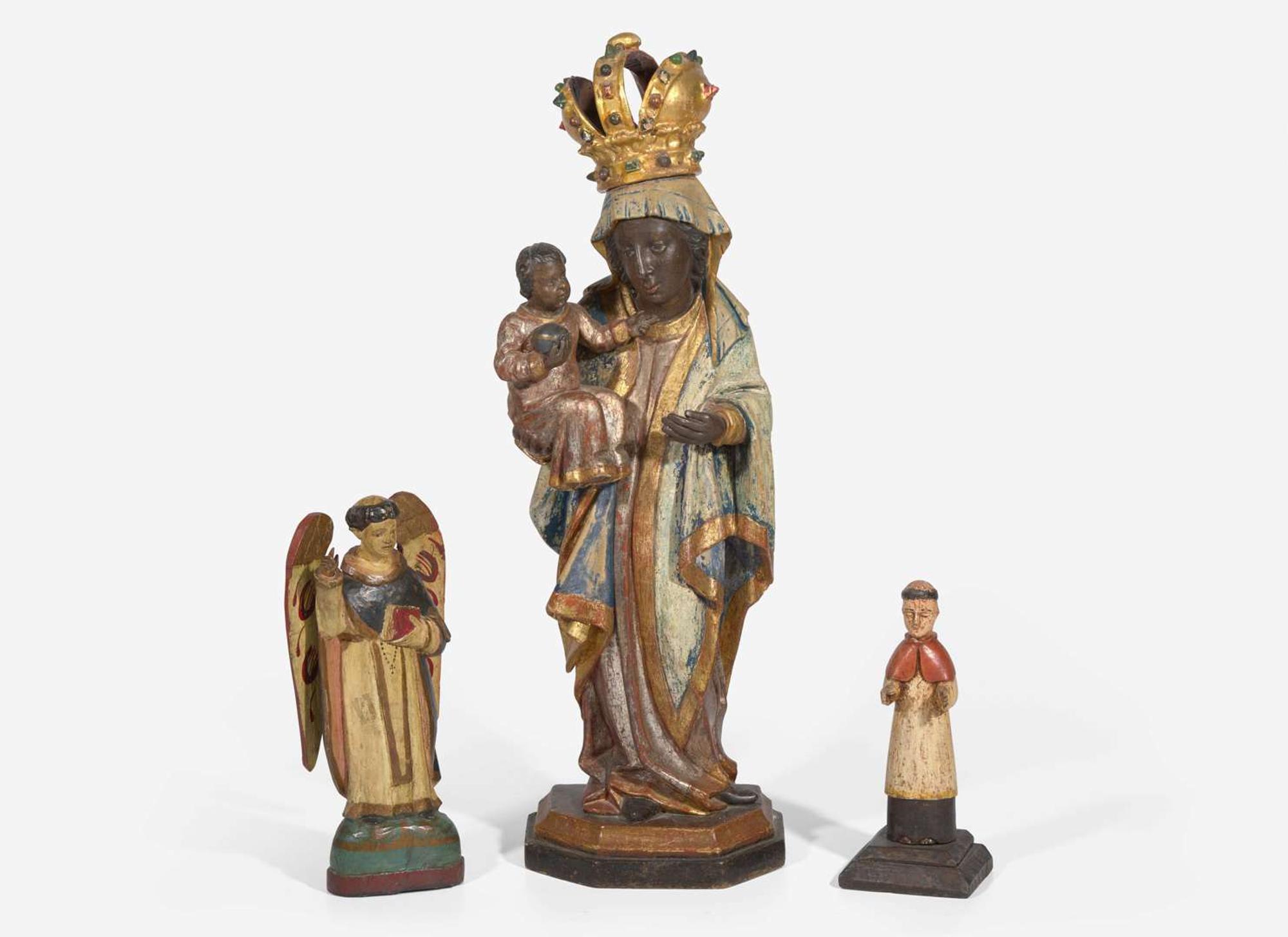 A group of three carved and painted Santos figures, 19th / 20th century