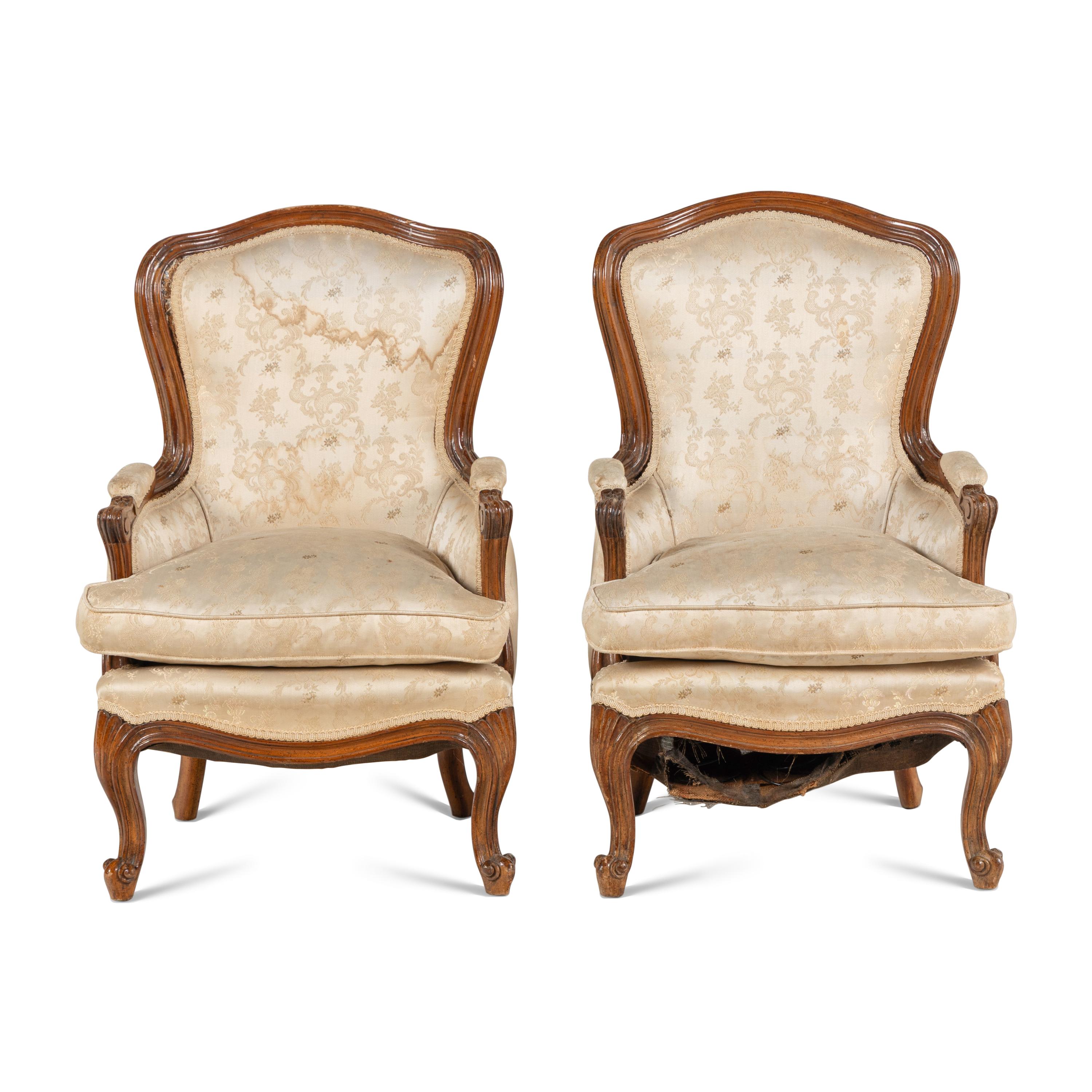 A Pair of Louis XV Style Carved Fruitwood Diminutive Bergerès