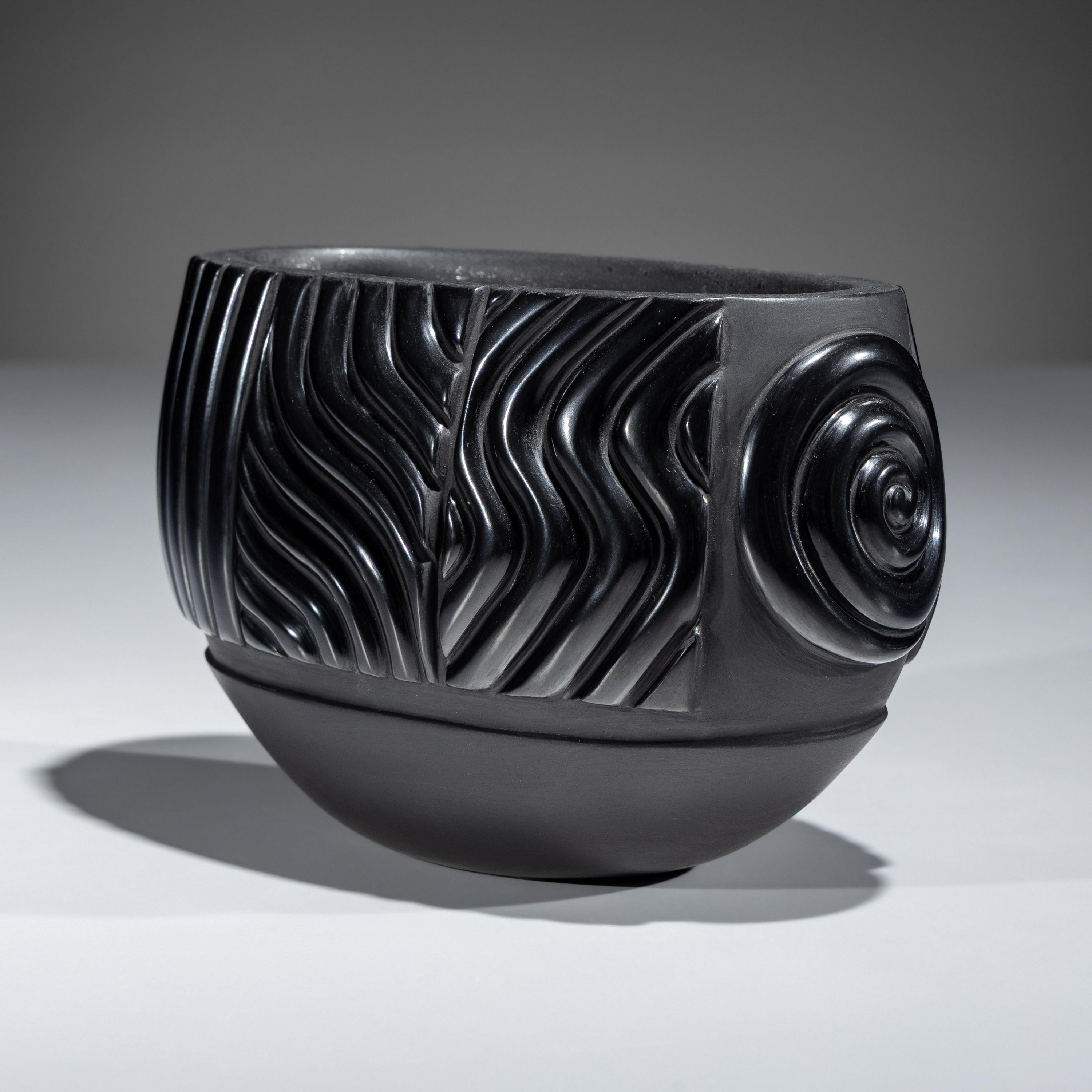 Carved Blackware Jar, with Micaceous Interior
