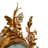 A Large Louis XV Style Gilt Bronze and Porcelain Mounted Clock
