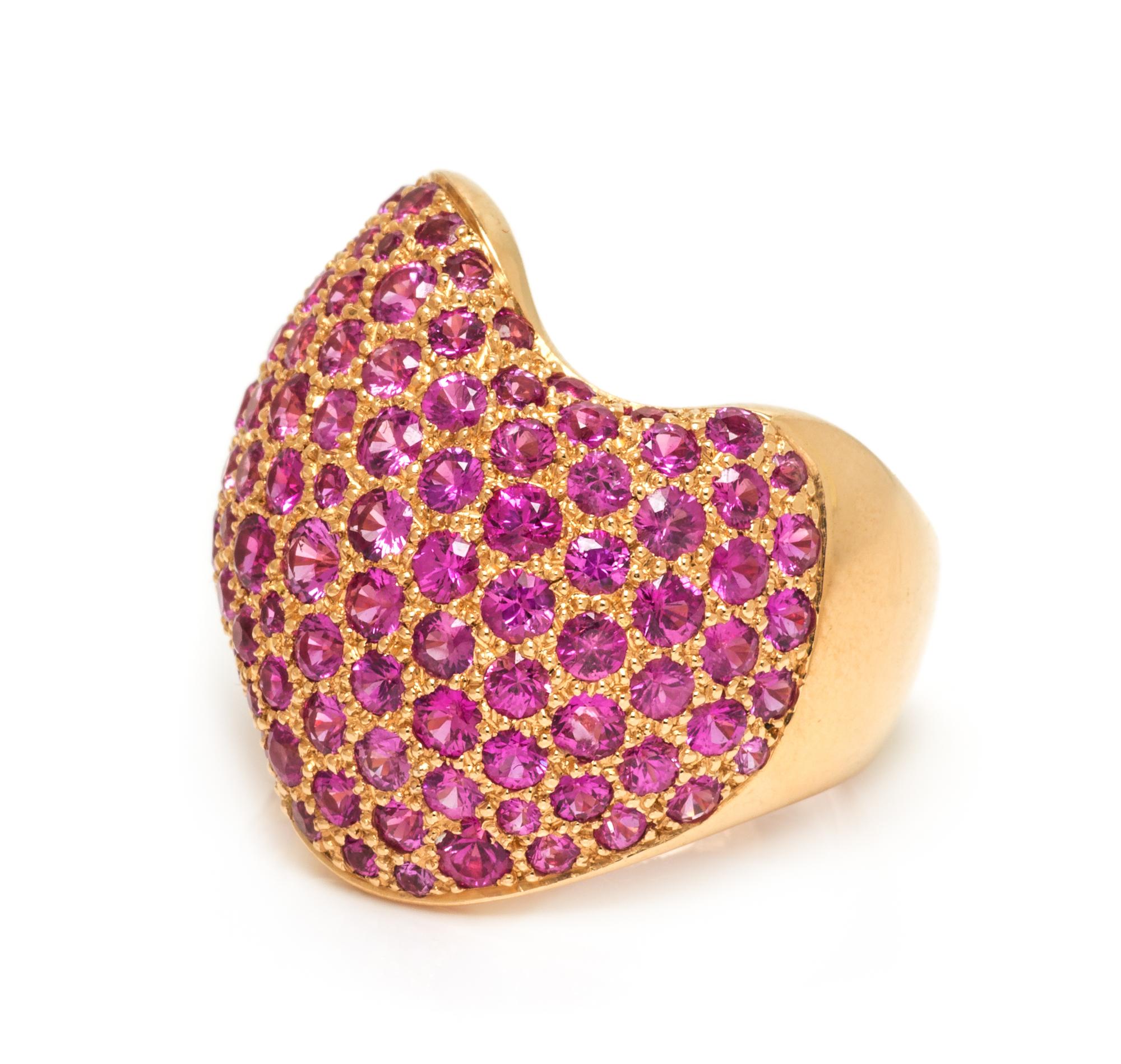 An 18 Karat Rose Gold and Pink Sapphire Wave Motif Ring, Van Cleef & Arpels, 9.30 dwts.
