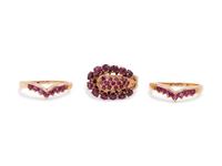 A Collection of 14 Karat Yellow Gold and Ruby Rings,