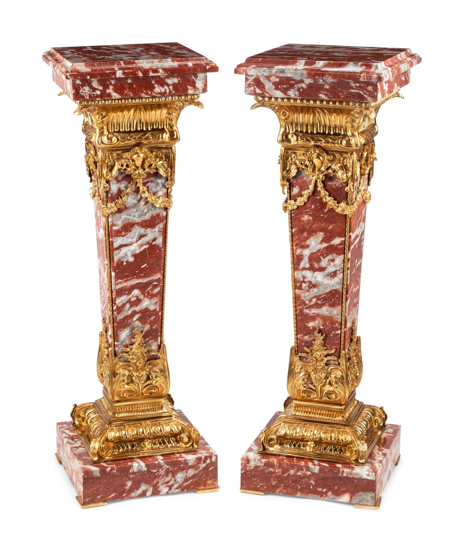 A Pair of Continental Gilt Bronze Mounted Rouge Marble Pedestals