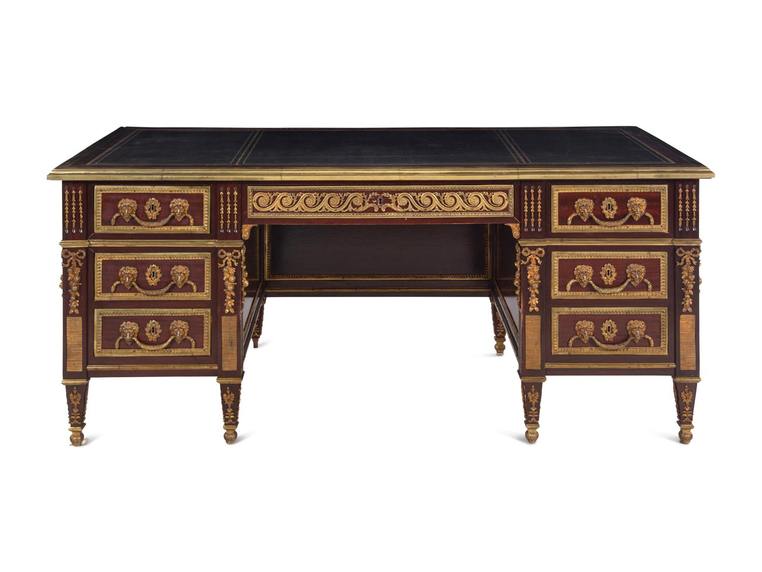 A Louis XVI Style Gilt Bronze Mounted Mahogany Pedestal Desk