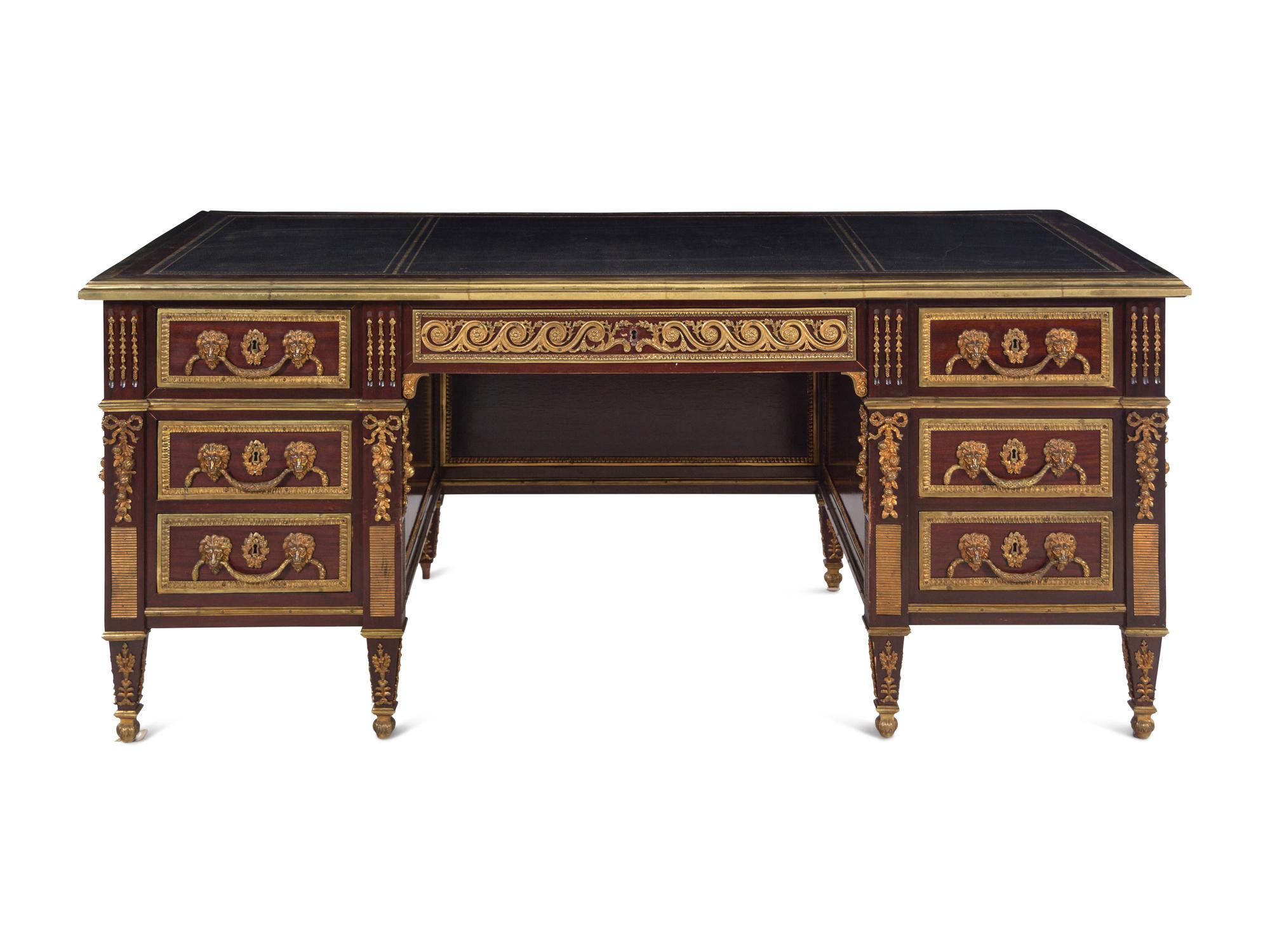 A Louis XVI Style Gilt Bronze Mounted Mahogany Pedestal Desk