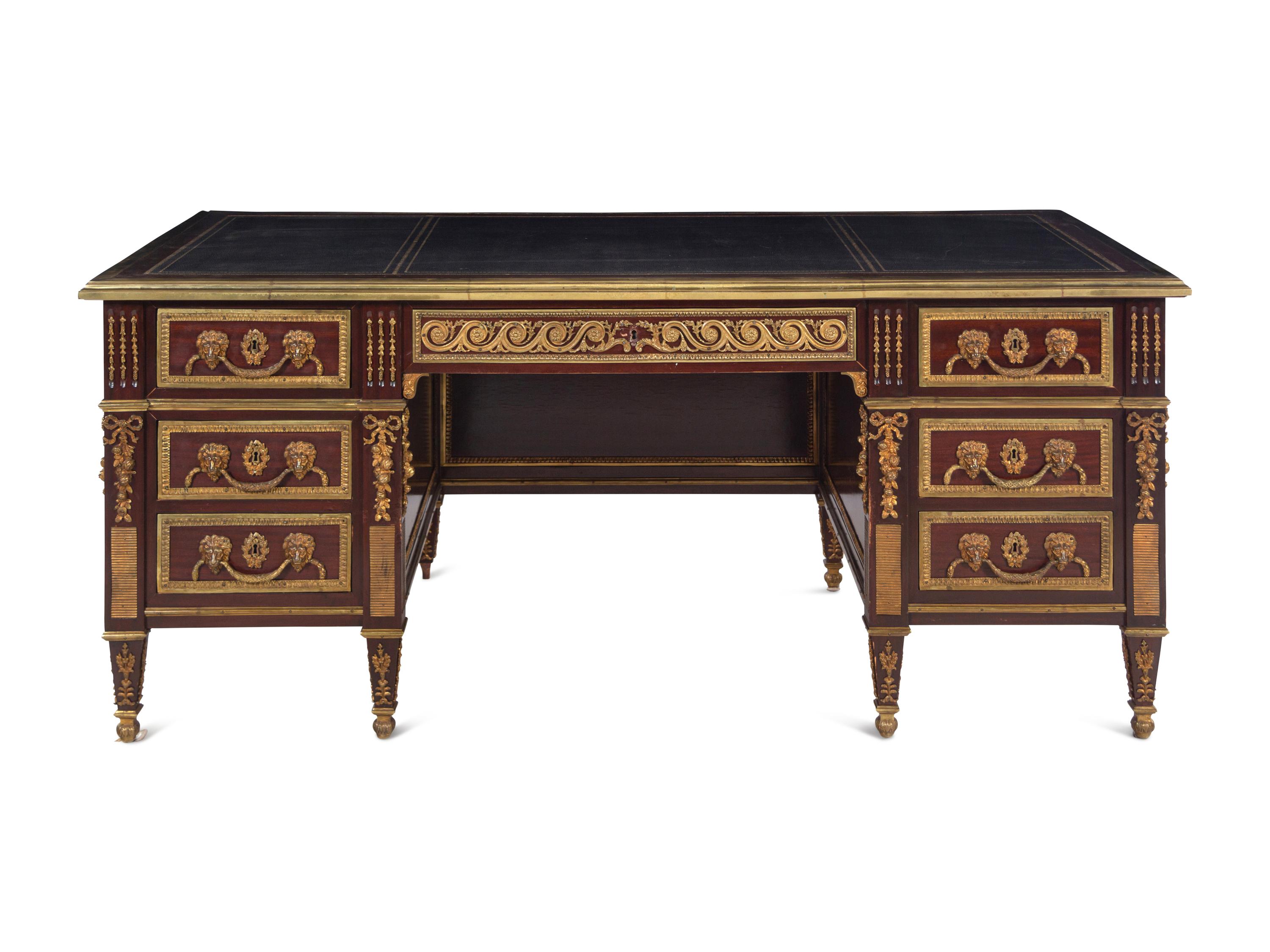 A Louis XVI Style Gilt Bronze Mounted Mahogany Pedestal Desk