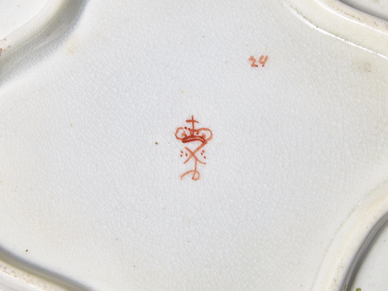 A Derby Parcel Gilt and Polychrome Armorial Porcelain Dinner Service