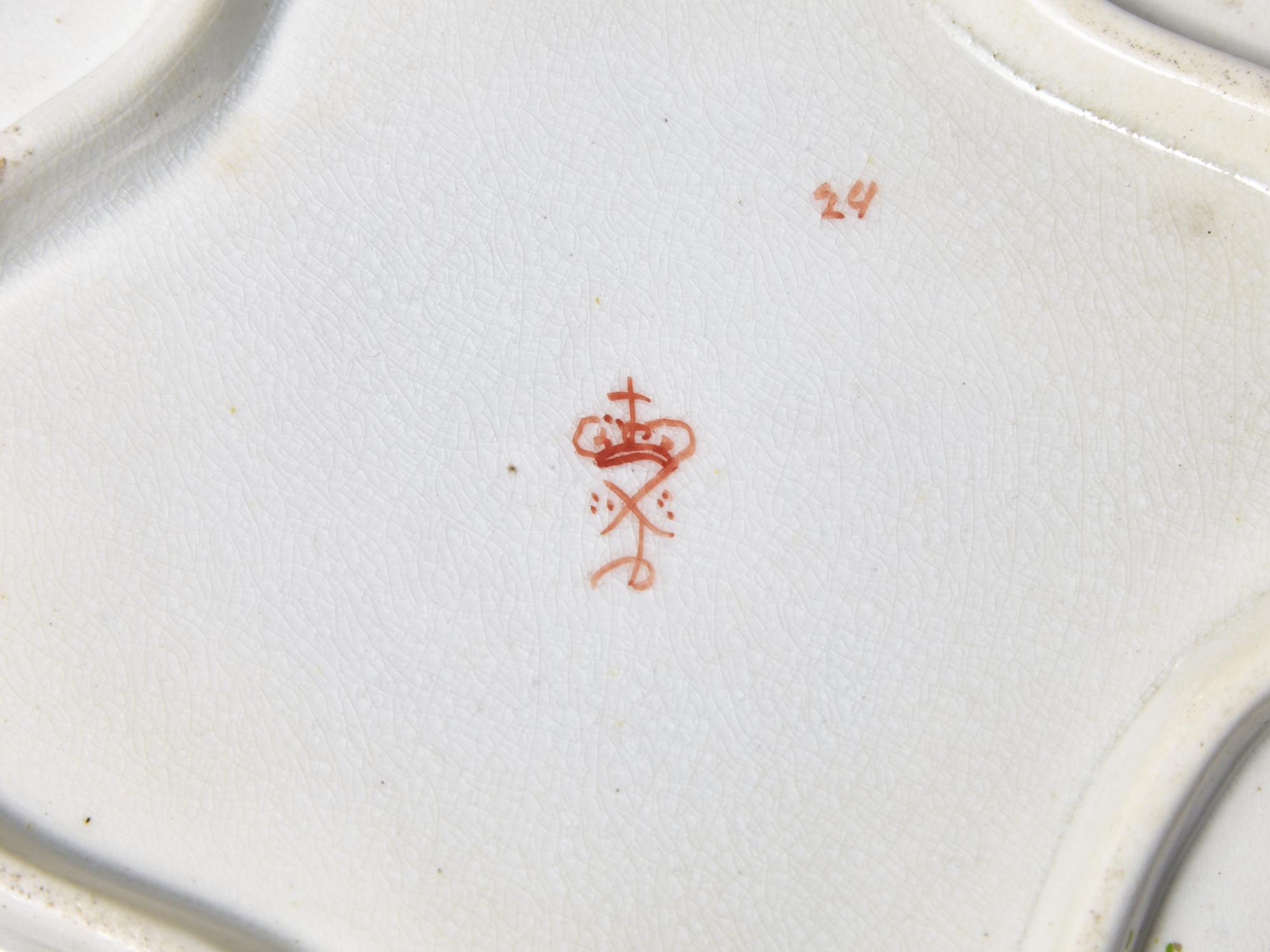A Derby Parcel Gilt and Polychrome Armorial Porcelain Dinner Service