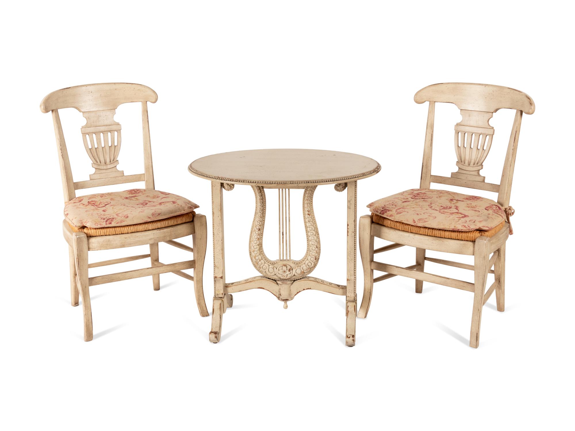 A Pair of Gustavian Style White-Painted Side Chairs and an Associated Table