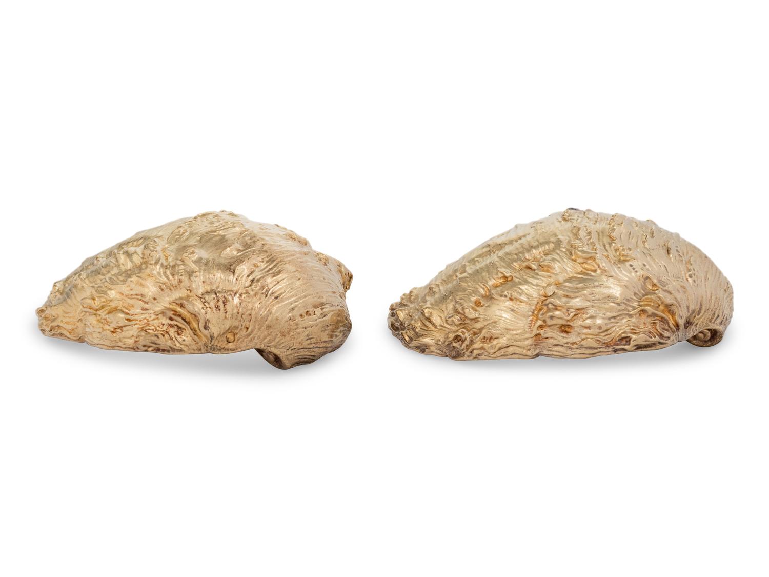 A Pair of French Parcel-Gilt Silver Shell-Form Salt Cellars