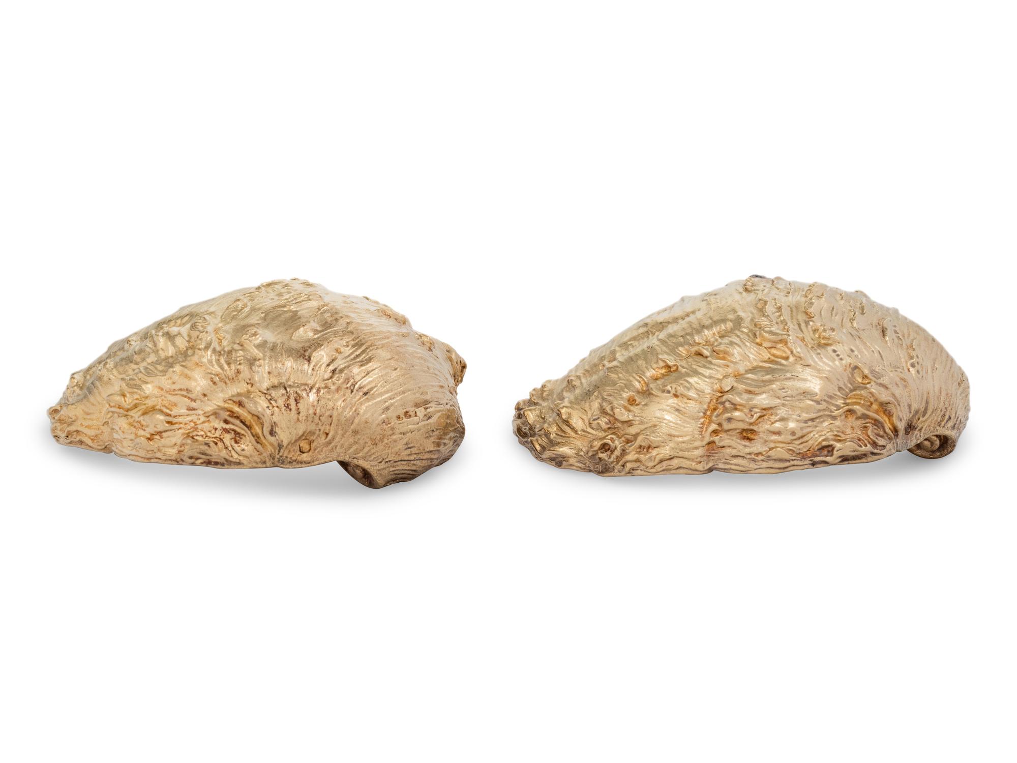 A Pair of French Parcel-Gilt Silver Shell-Form Salt Cellars