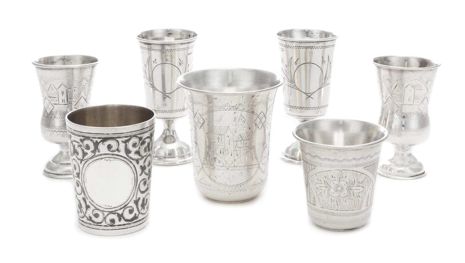 A Group of Seven Russian Silver Drinking Articles, Various Makers, Late 19th/Early 20th Century, comprising four cordials and three bea
