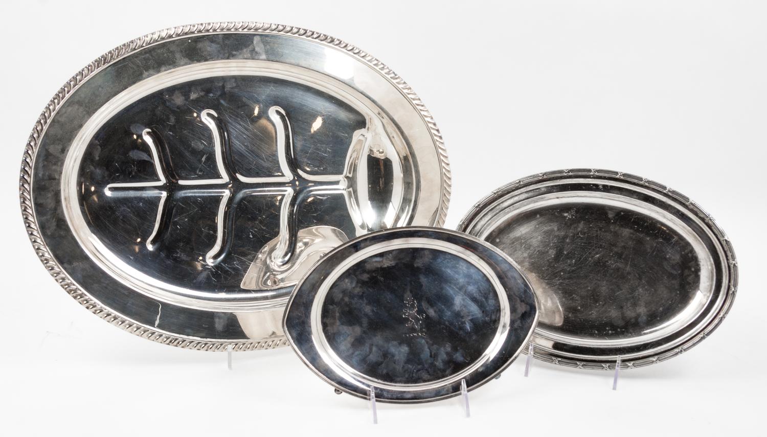 Three Silver-plate Trays, 20TH CENTURY, each of oval form comprising a Sheffield well and tree meat platter, an International for Pullm