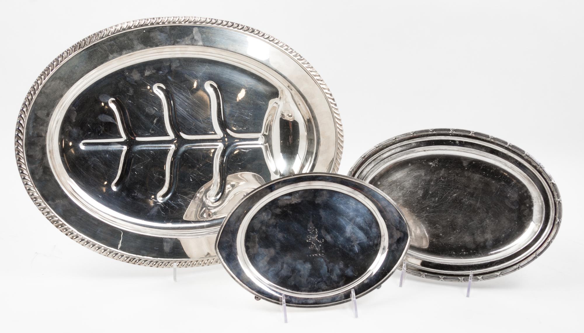 Three Silver-plate Trays, 20TH CENTURY, each of oval form comprising a Sheffield well and tree meat platter, an International for Pullm