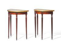 A pair of George III parcel-gilt mahogany demilune console tables with inset tops, circa 1810 and later