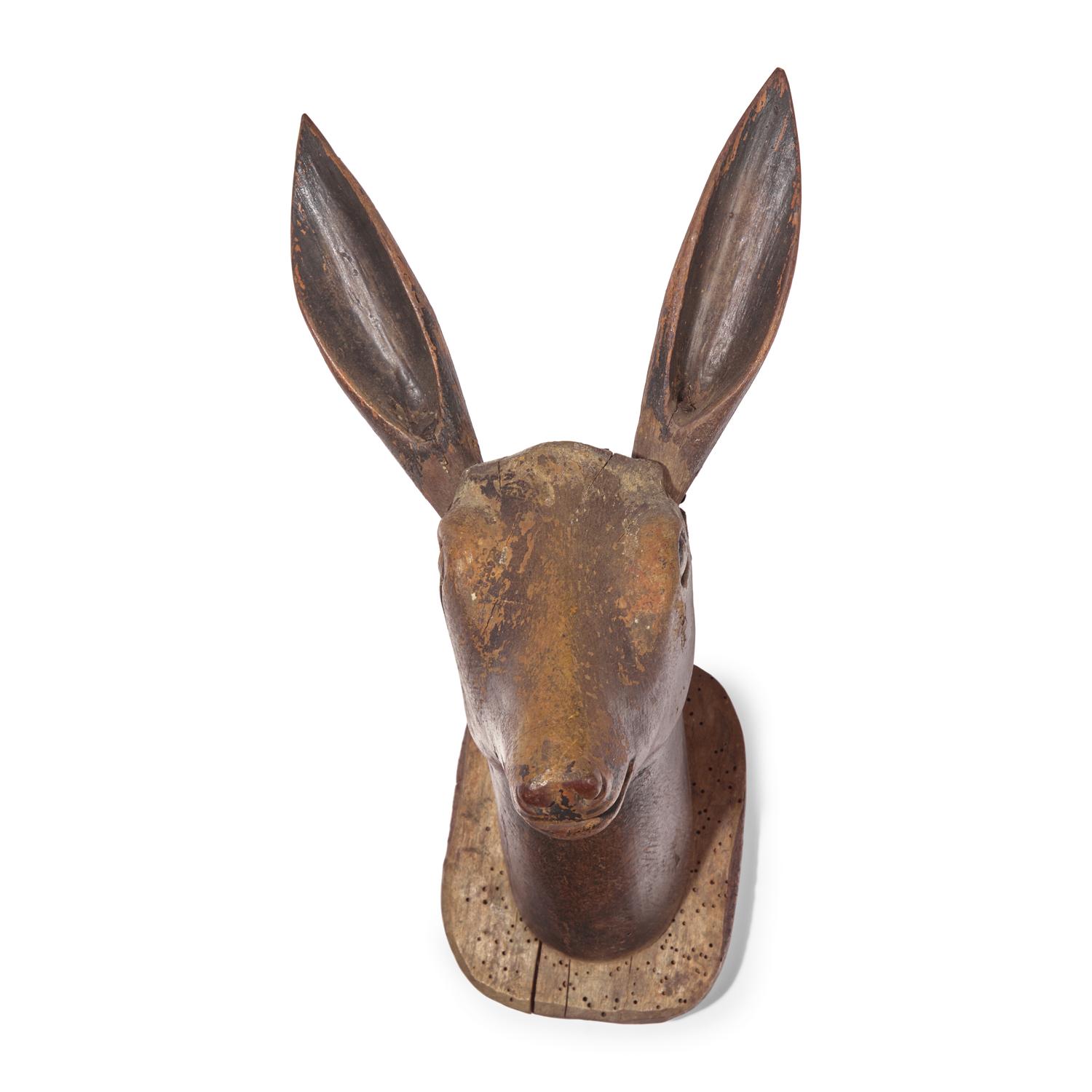 A Carved and Painted Wood Deer Head