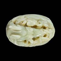 A Chinese pale celadon jade reticulated "Dragon" finial 青白玉镂空龙形炉端