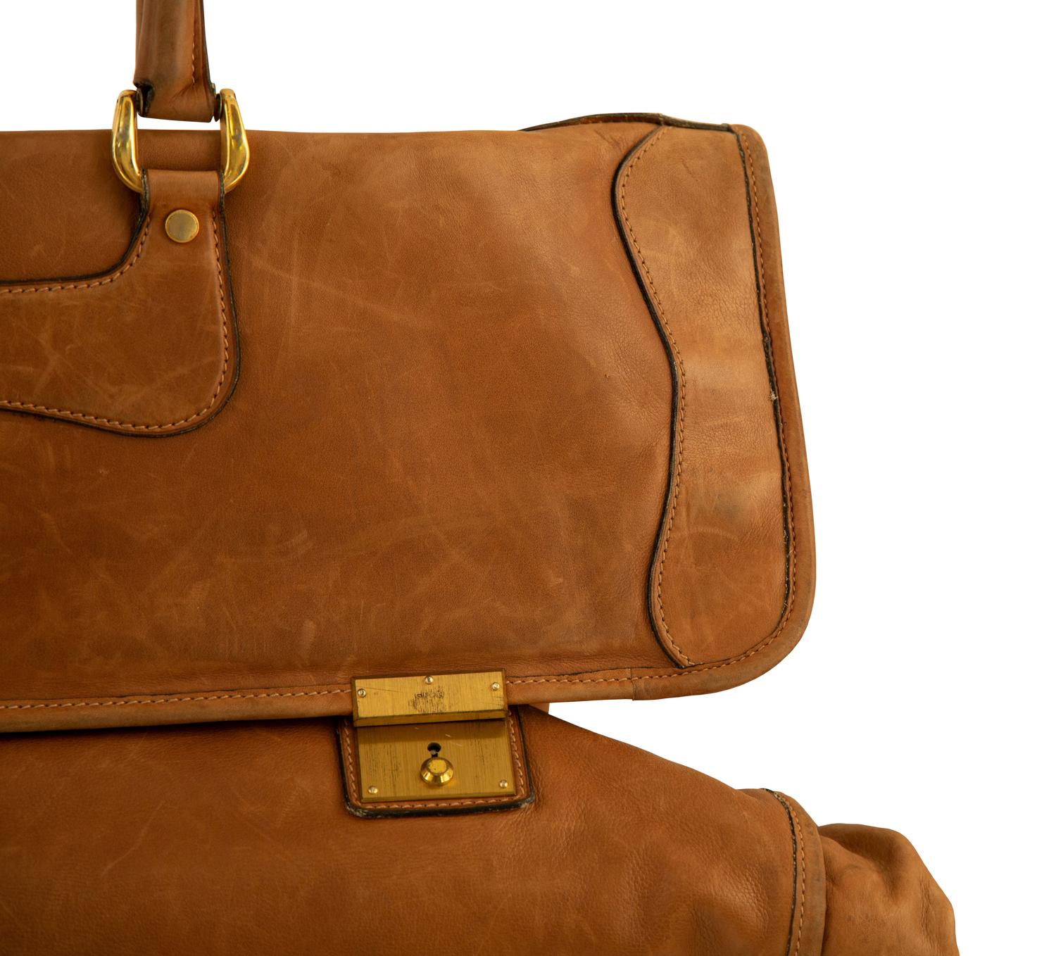 Two Bottega Veneta Suitcases and a Gucci Leather Garment Bag