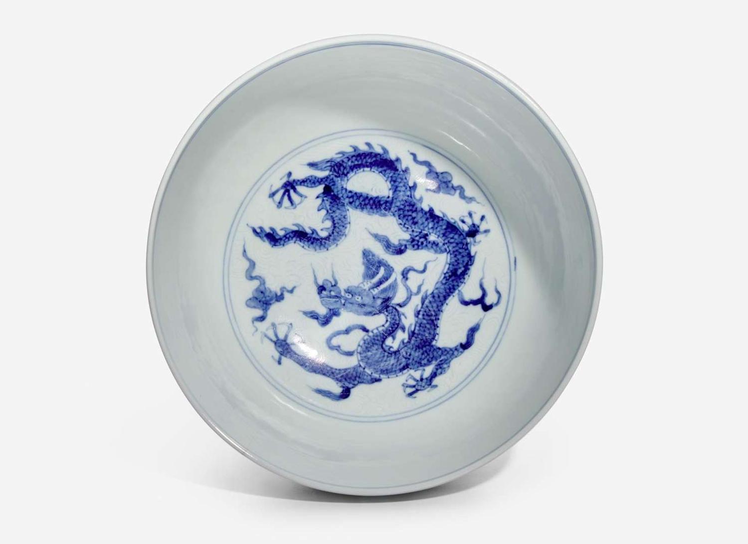An unusual Chinese blue and white "Dragon" deep bowl, Zhengde mark, possibly 18th century 青花龍紋深腹盌 正德款 或十八世紀