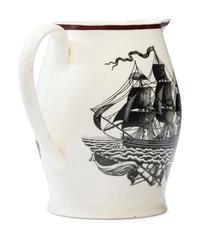 A Liverpool Creamware 'Farmer's Arms' Portrait Pitcher